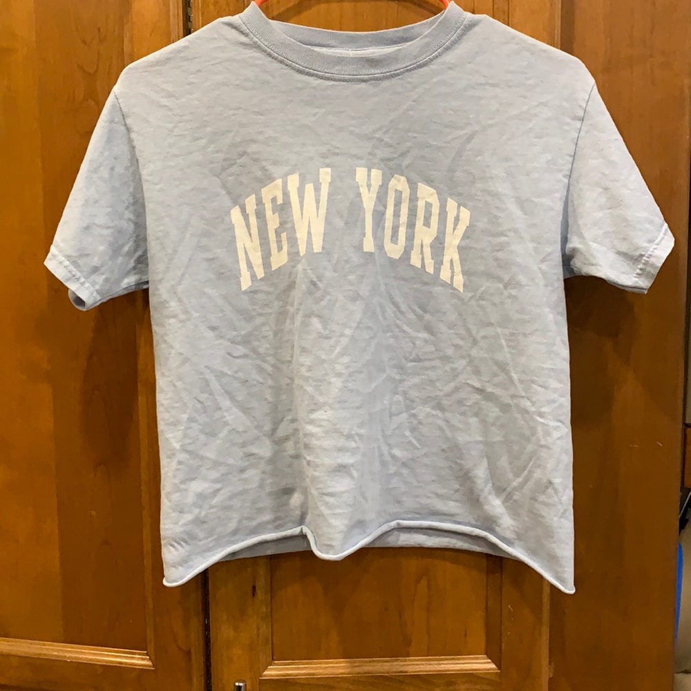 Brandy Melville: Light Blue “New York” - Tee
